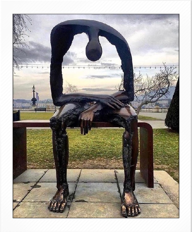 statue grieving parents